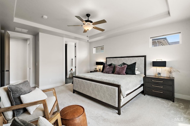 6071 S Pioneer Trail Way, Meridian, ID 83642 - bedroom featuring a raised ceiling, light carpet, and a ceiling fan