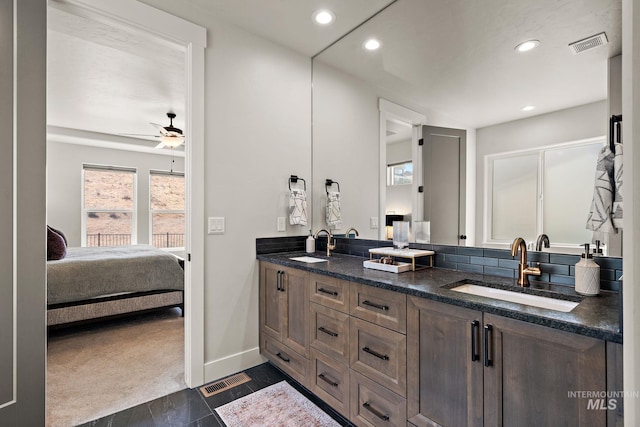 6071 S Pioneer Trail Way, Meridian, ID 83642 - ensuite bathroom with double vanity, ceiling fan, and recessed lighting