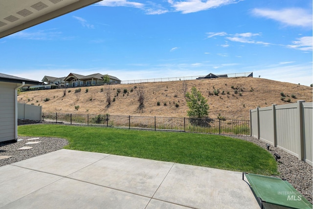 6071 S Pioneer Trail Way, Meridian, ID 83642 - fenced backyard featuring a patio area
