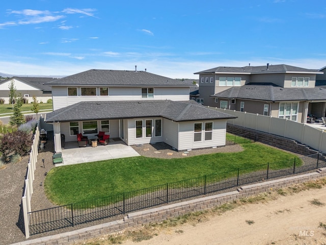 6071 S Pioneer Trail Way, Meridian, ID 83642 - rear view of house featuring a patio, a fenced backyard, and a shingled roof