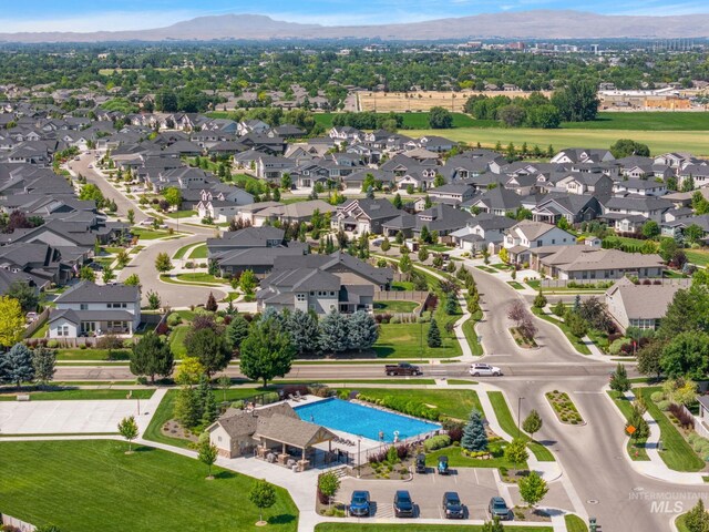 6071 S Pioneer Trail Way, Meridian, ID 83642 - aerial view of a mountain backdrop and a pool