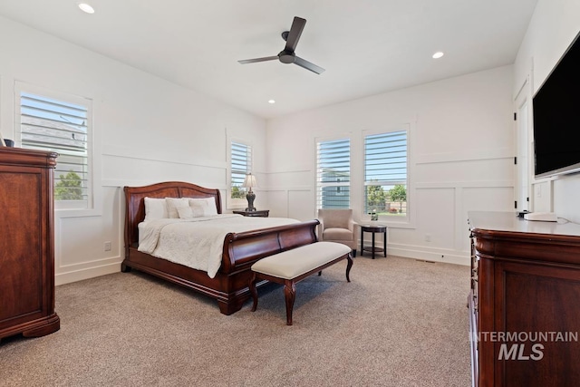 6706 Big Wood Way, Star, ID 83669 - bedroom with light colored carpet, a decorative wall, recessed lighting, and ceiling fan