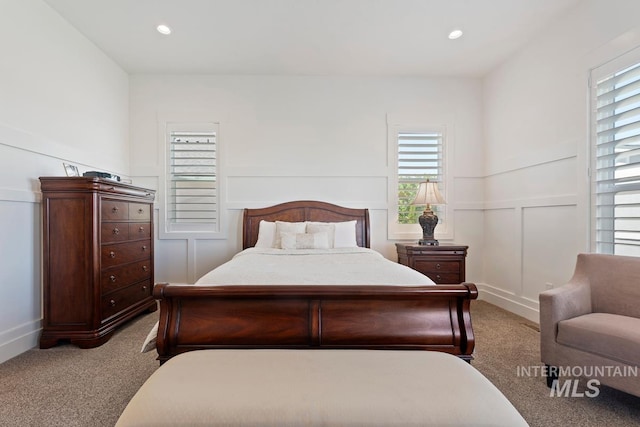6706 Big Wood Way, Star, ID 83669 - carpeted bedroom with a decorative wall, recessed lighting, and wainscoting