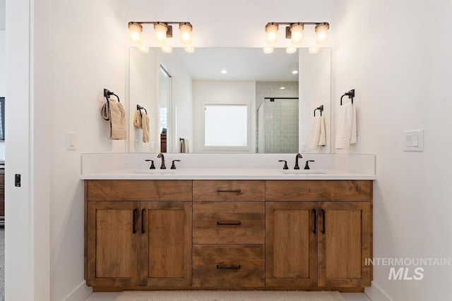 6706 Big Wood Way, Star, ID 83669 - bathroom featuring double vanity, a shower stall, and decorative backsplash