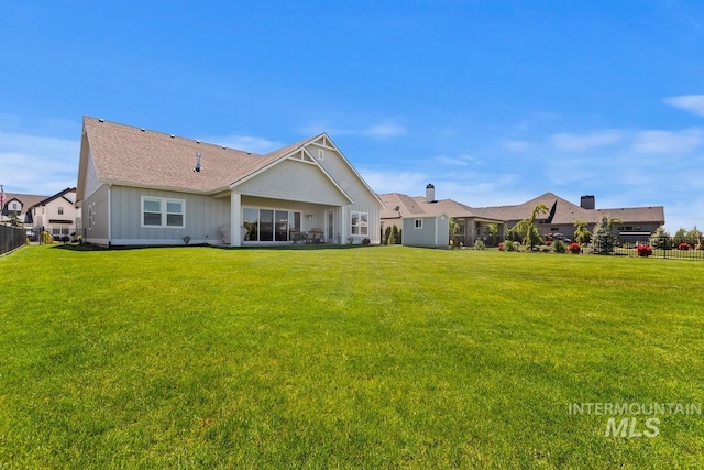 6706 Big Wood Way, Star, ID 83669 - rear view of property with board and batten siding