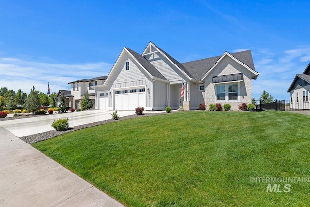 6706 Big Wood Way, Star, ID 83669 - view of front facade featuring board and batten siding, a garage, and driveway
