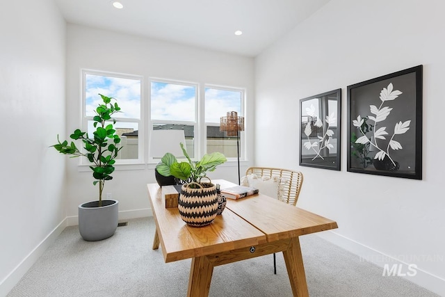 carpeted dining room featuring baseboards and recessed lighting
