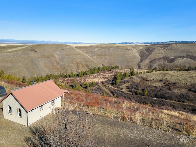 drone / aerial view featuring a mountain view