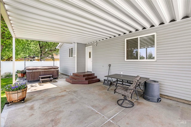 view of patio / terrace featuring a hot tub