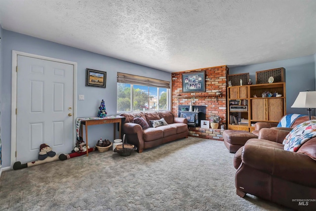 carpeted living room with brick wall, a textured ceiling, and a brick fireplace