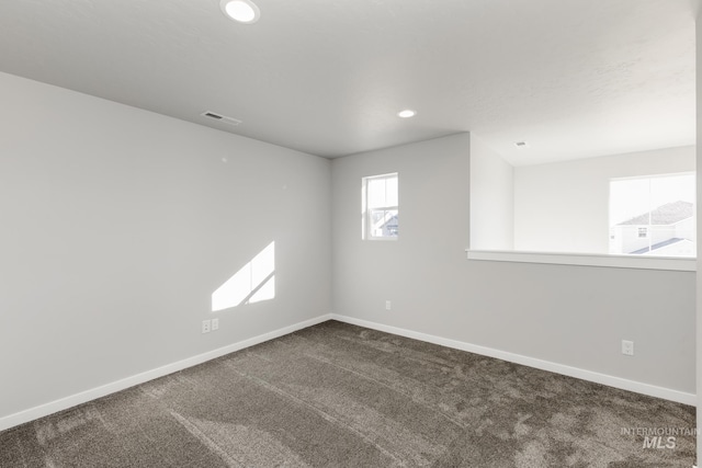 4429 N Magical Creek Ave, Meridian, ID 83646 - unfurnished room featuring baseboards, dark colored carpet, and recessed lighting