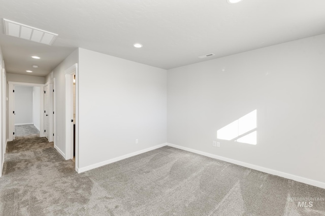 4429 N Magical Creek Ave, Meridian, ID 83646 - spare room featuring carpet, baseboards, and recessed lighting
