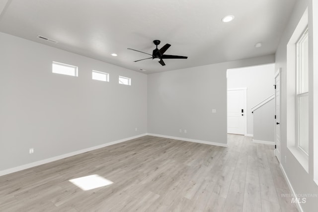 4429 N Magical Creek Ave, Meridian, ID 83646 - empty room with ceiling fan, recessed lighting, light wood finished floors, and baseboards