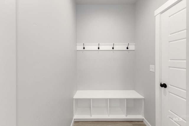 4429 N Magical Creek Ave, Meridian, ID 83646 - mudroom featuring wood finished floors and baseboards