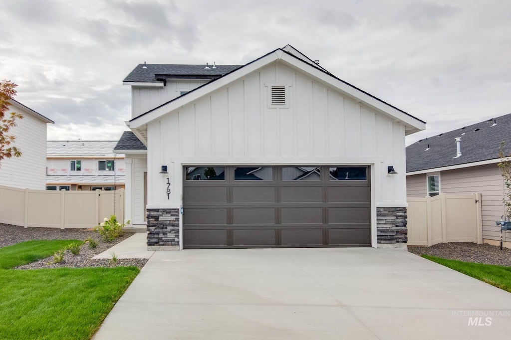 view of front of property with a garage