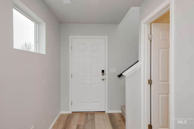 entryway with light wood-type flooring