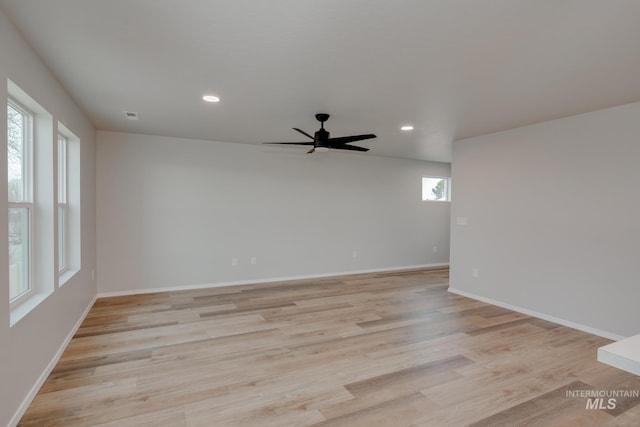 unfurnished room with light hardwood / wood-style floors and ceiling fan