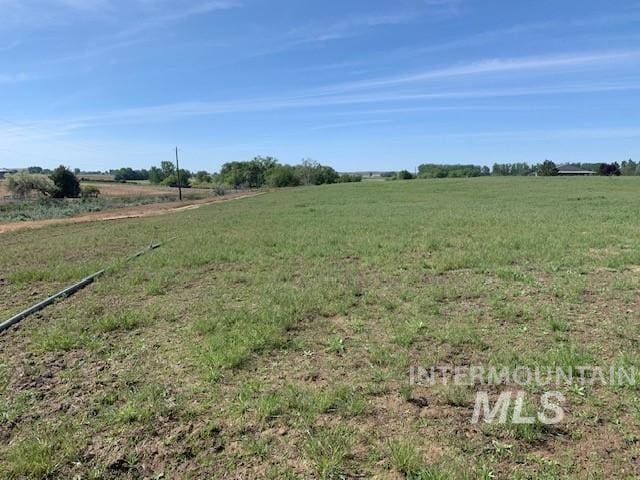5720 SE 3rd Ave, New Plymouth, ID 83655 - view of green lawn featuring a rural view
