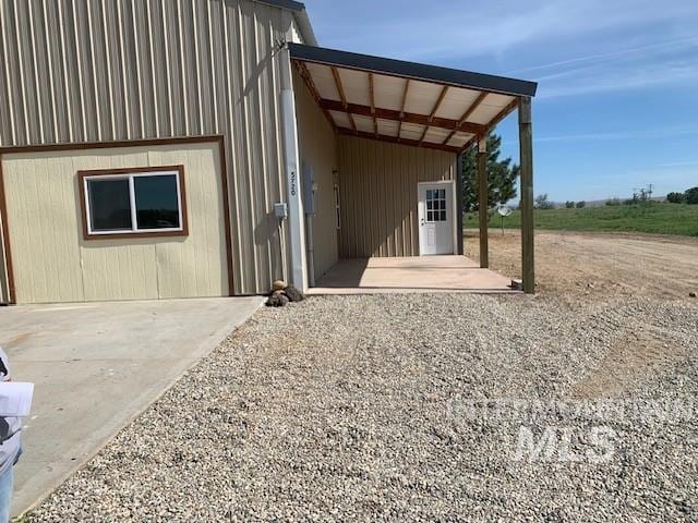 5720 SE 3rd Ave, New Plymouth, ID 83655 - view of exterior entry with a carport