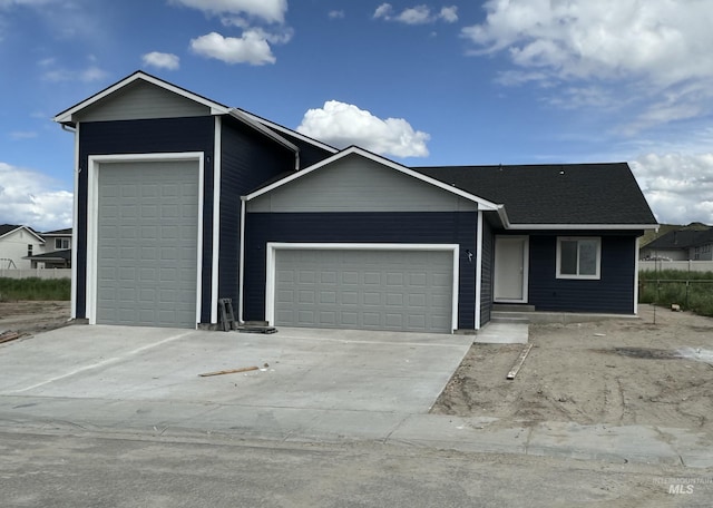 single story home with a garage