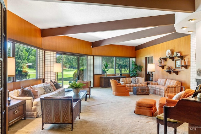 living room featuring wood walls, brick wall, vaulted ceiling with beams, and light colored carpet