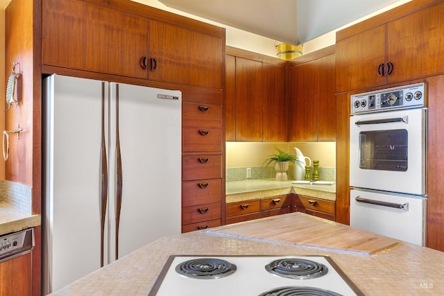 kitchen featuring white appliances