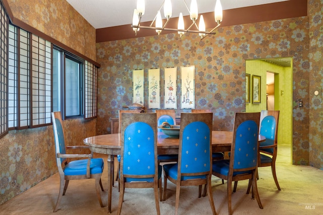 dining area with a notable chandelier