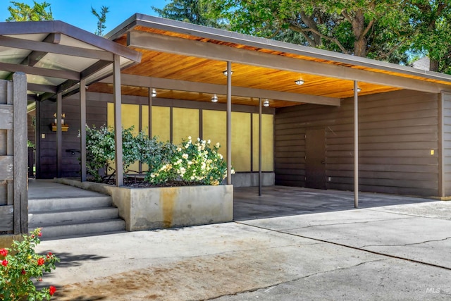 view of patio featuring a carport