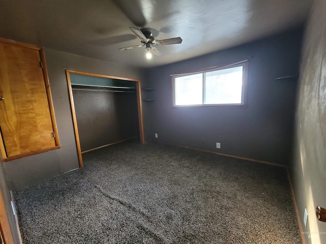 unfurnished bedroom featuring a closet, ceiling fan, and dark carpet