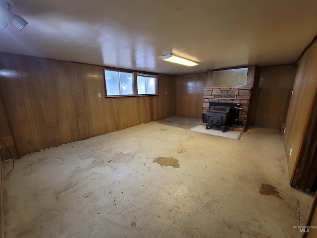 basement featuring a wood stove