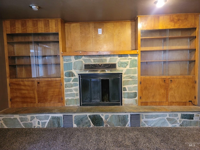 unfurnished living room featuring a fireplace