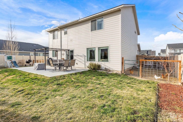 back of property featuring a patio, a lawn, and a fenced backyard