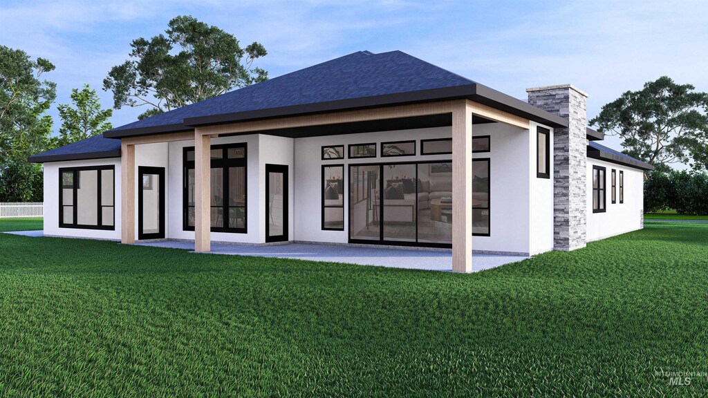 22909 Cirrus Vw, Caldwell, ID 83709 - rear view of house featuring a yard, a chimney, stucco siding, and a patio area