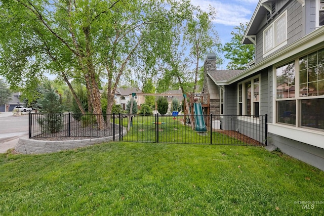 view of yard with a playground