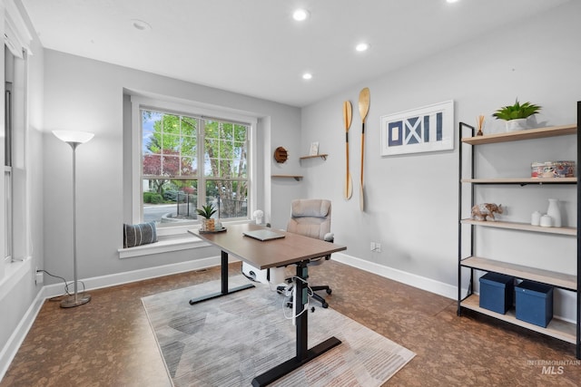 office space with recessed lighting and baseboards