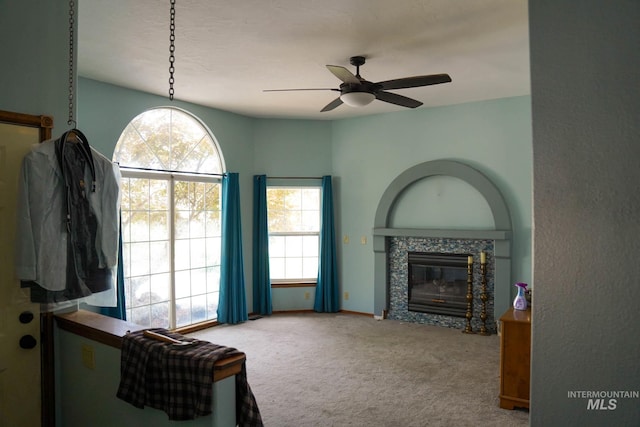1011 N Spirea, Boise, ID 83713 - living room with carpet, ceiling fan, and a fireplace