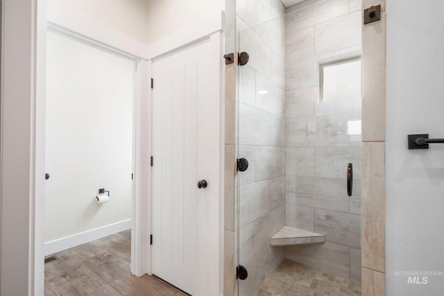 7253 River View Dr, Marsing, ID 83639 - bathroom with a shower stall and wood finished floors