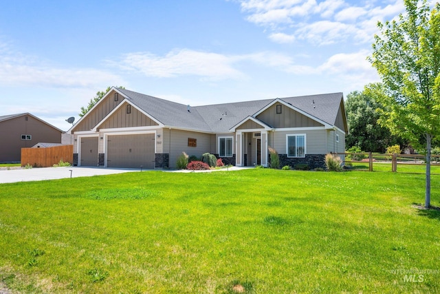 7253 River View Dr, Marsing, ID 83639 - craftsman inspired home featuring board and batten siding, stone siding, an attached garage, and driveway