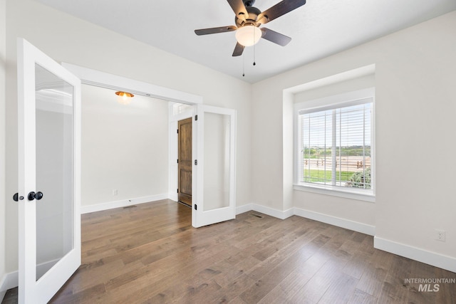 7253 River View Dr, Marsing, ID 83639 - spare room with a ceiling fan, wood finished floors, and french doors
