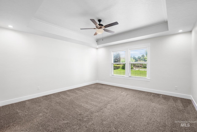 7253 River View Dr, Marsing, ID 83639 - carpeted empty room featuring a tray ceiling, a ceiling fan, crown molding, and recessed lighting