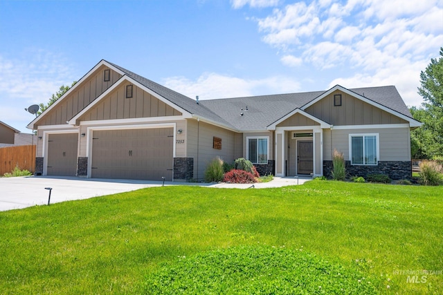 7253 River View Dr, Marsing, ID 83639 - craftsman-style house with board and batten siding, stone siding, an attached garage, and driveway