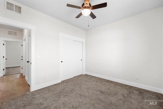 7253 River View Dr, Marsing, ID 83639 - unfurnished bedroom featuring carpet floors, a closet, and a ceiling fan