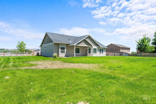 7253 River View Dr, Marsing, ID 83639 - rear view of house featuring board and batten siding