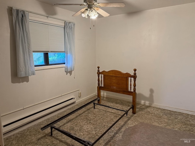 bedroom featuring baseboards, a baseboard radiator, and a ceiling fan
