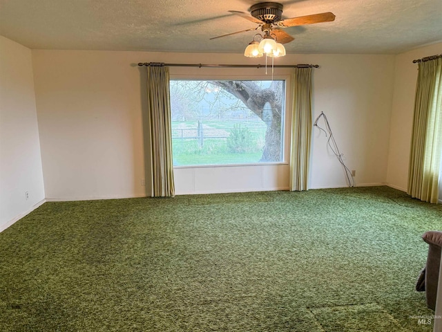 unfurnished room with carpet floors, a textured ceiling, and ceiling fan