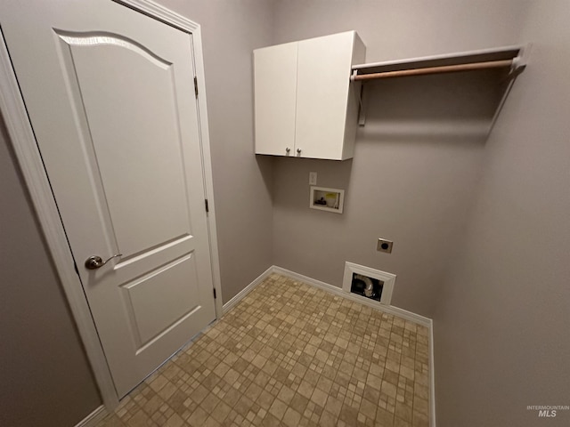 washroom featuring cabinets, hookup for a washing machine, and hookup for an electric dryer