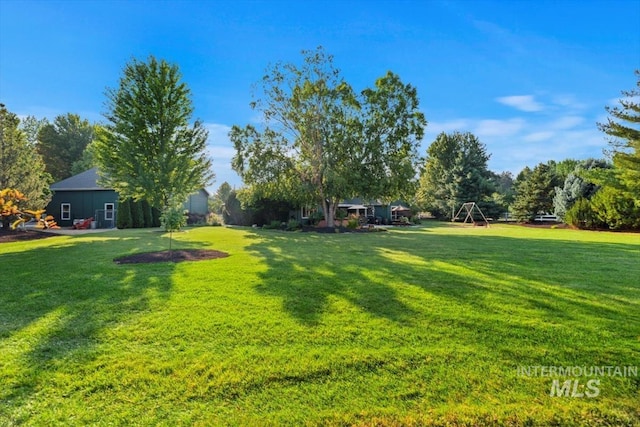 view of yard with a playground