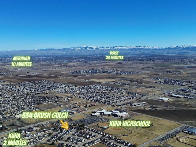 aerial view featuring a mountain view