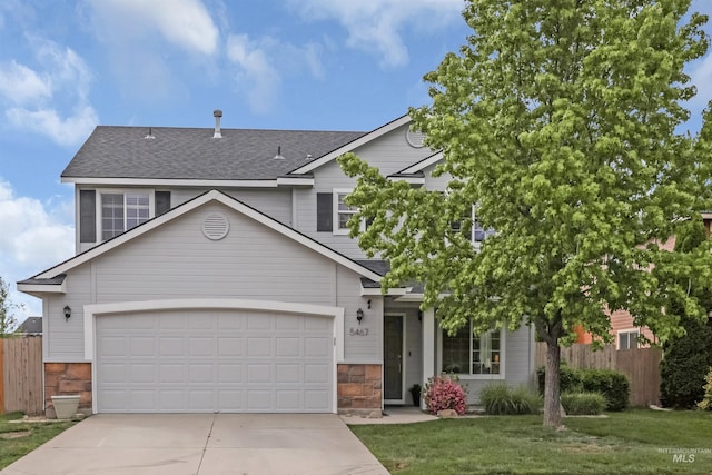 5467 N Claret Cup Way, Meridian, ID 83646 - view of front facade with driveway and roof with shingles