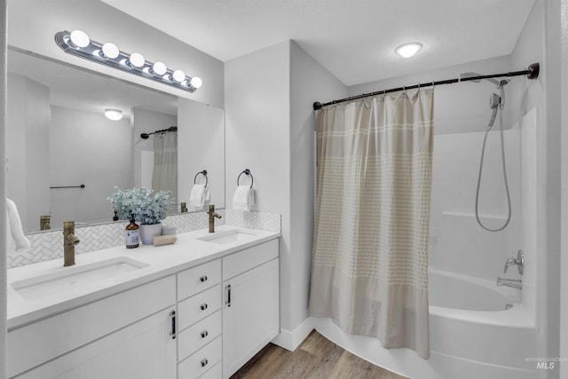 5467 N Claret Cup Way, Meridian, ID 83646 - full bathroom featuring shower / bath combo, backsplash, double vanity, and wood finished floors